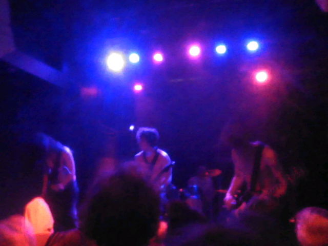the performers of awannabe all performing onstage shirtless